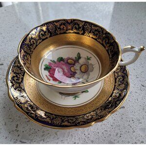 Paragon Cup & Saucer Gold on Black Pink Rose Center